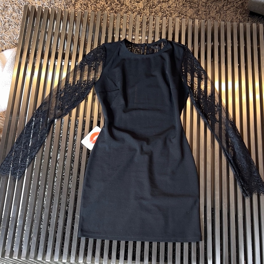 Black backless, mini dress with lace, long sleeves and lace cut out back